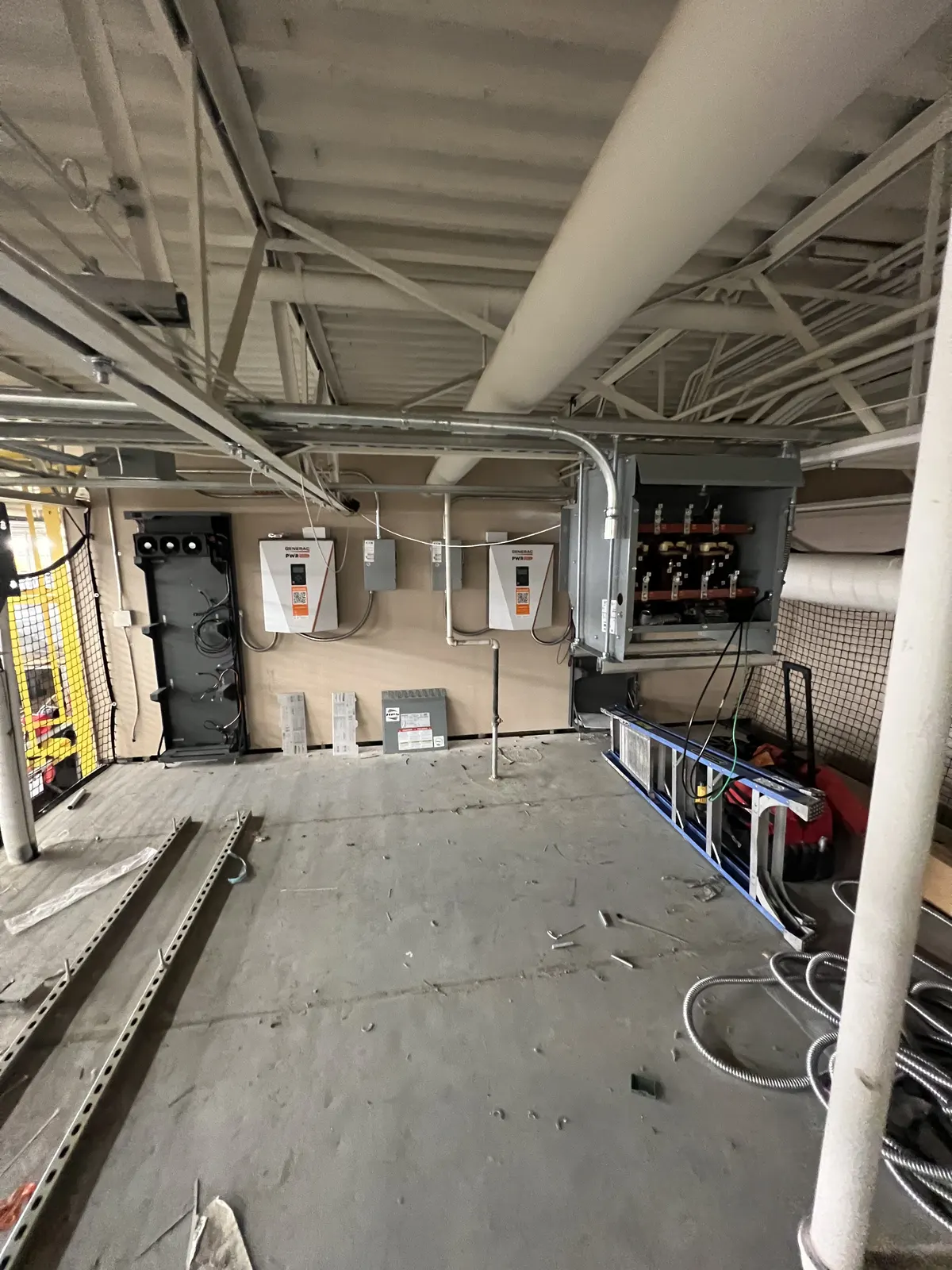 Commercial build-out: Panels and conduit for a commercial tenant space.
