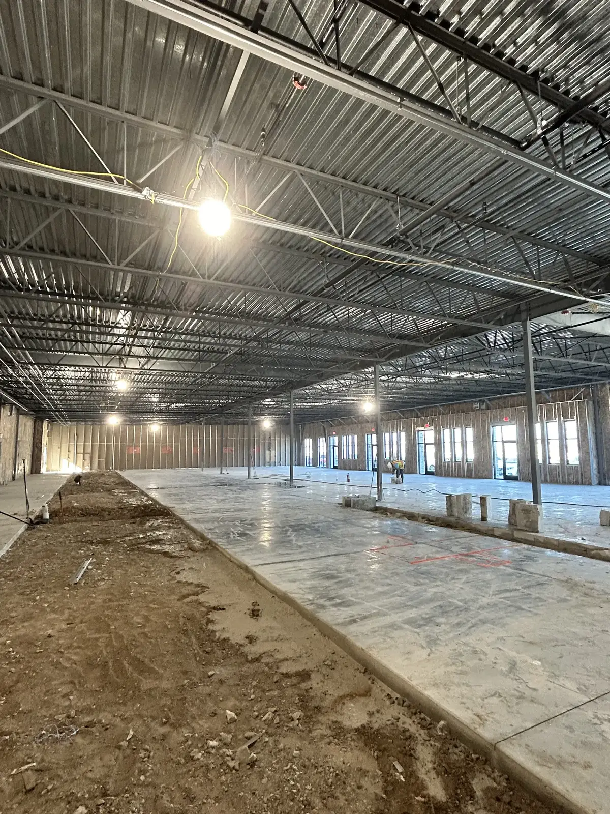 Commercial lighting: High-bay lighting installed in a new commercial building.
